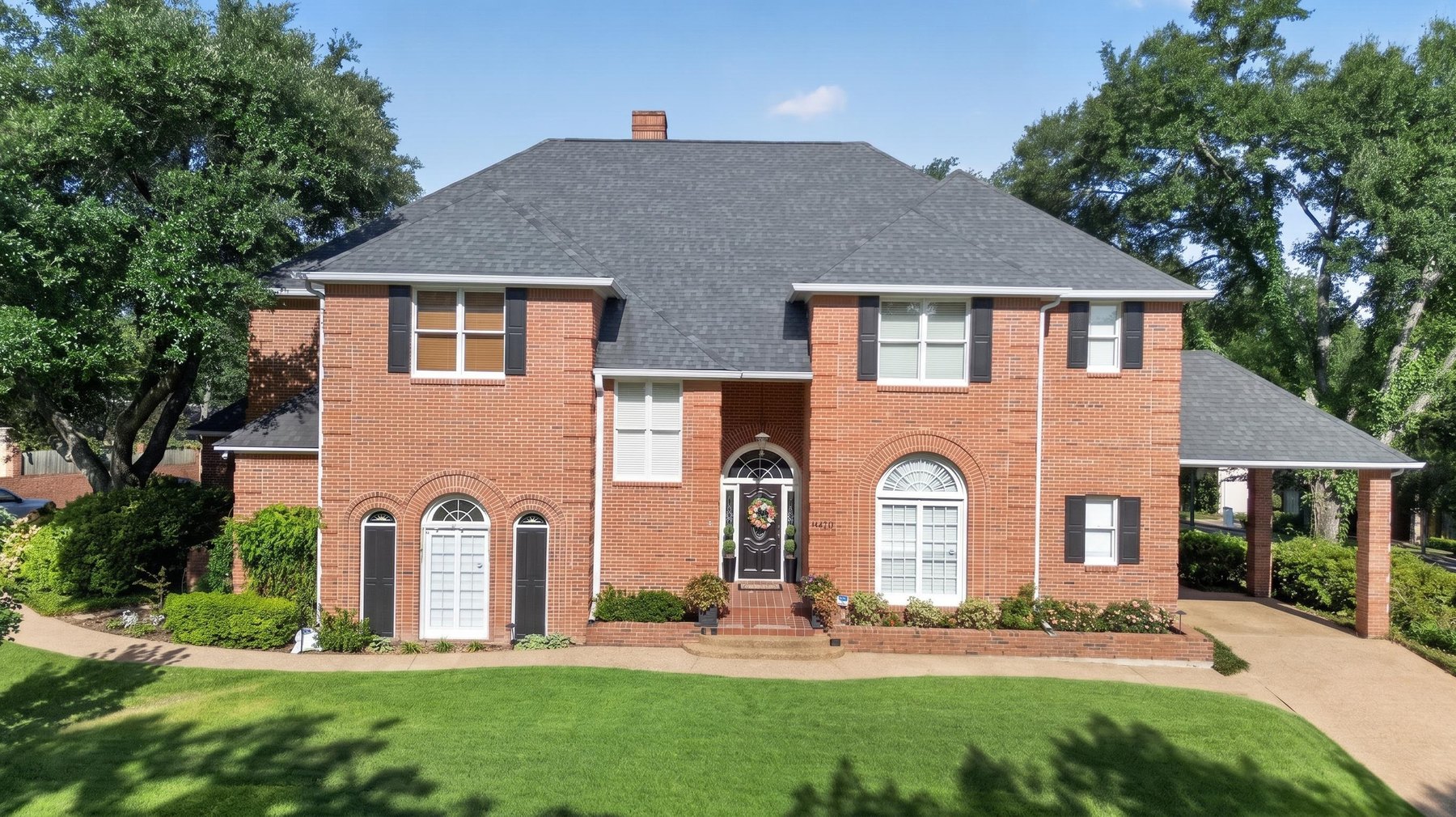 Luxury real estate exterior photography at 6401 Hollytree Circle in Tyler Texas