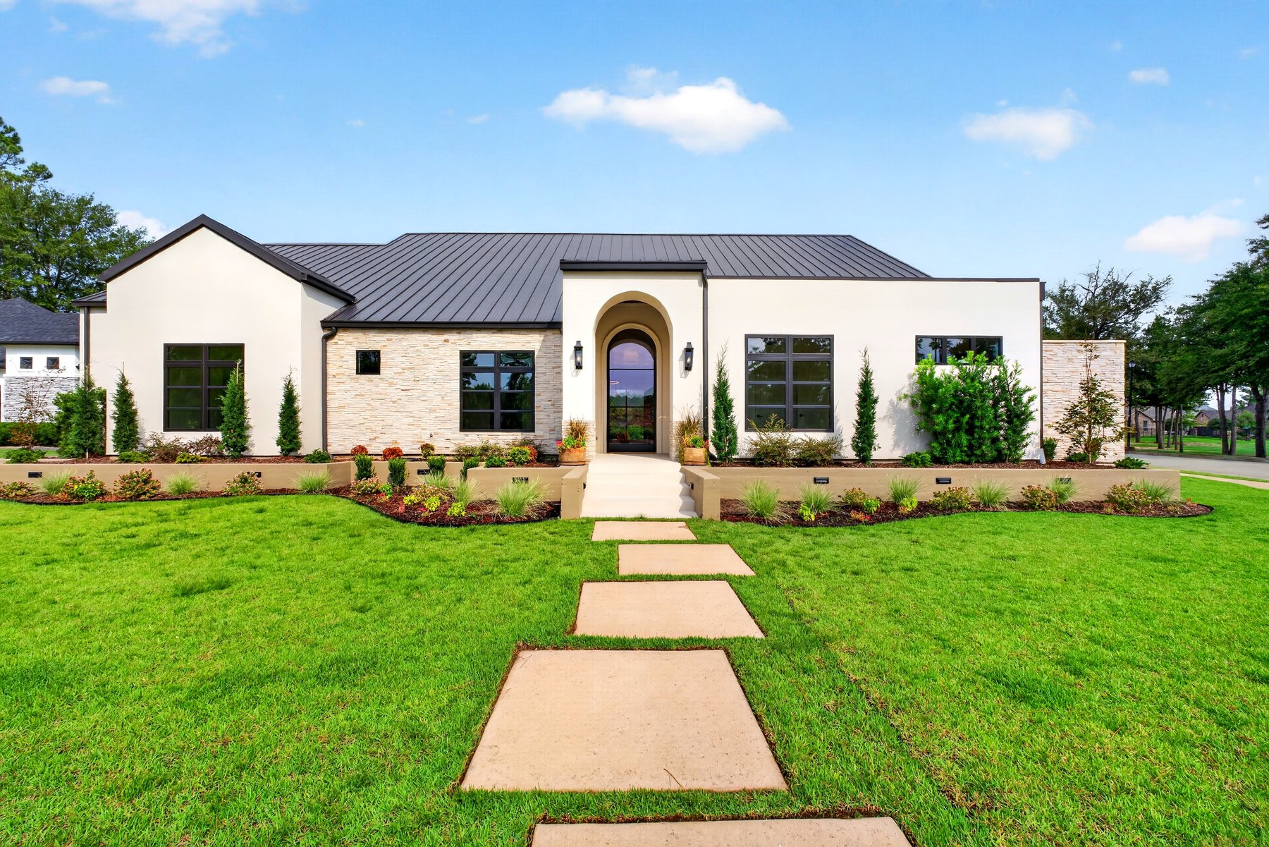 Professional exterior real estate photography in the Lakeside at The Crossing neighborhood of Tyler Texas