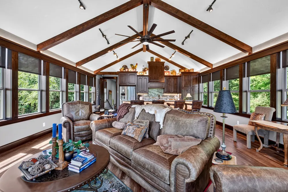 Great room with vaulted ceiling and open seating area